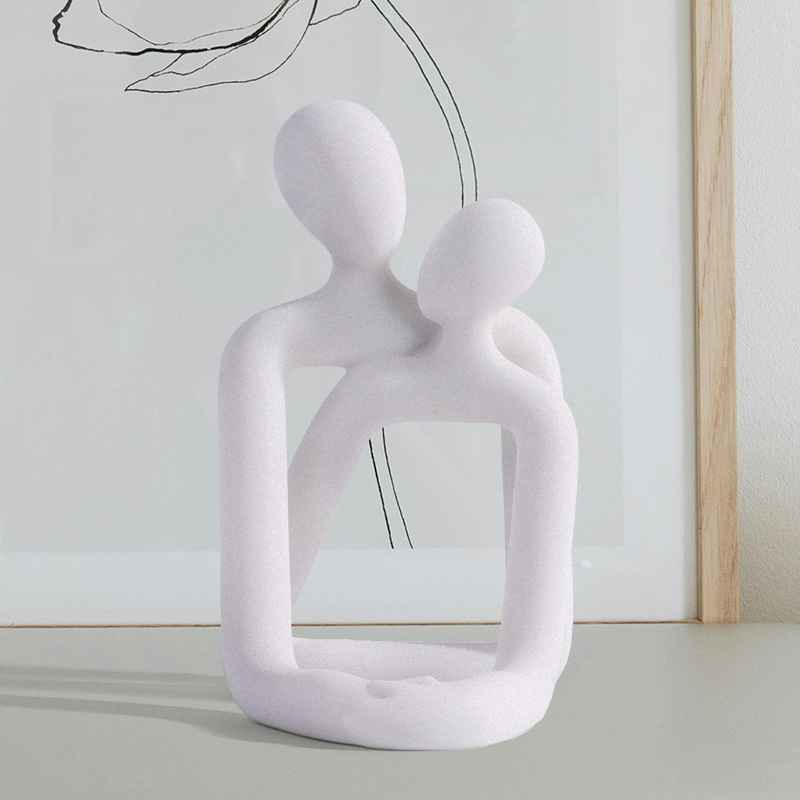 Couple embrace phone holder sc - Interior Design Book reseña y precio